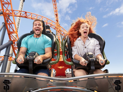 Man and woman on a roller coaster