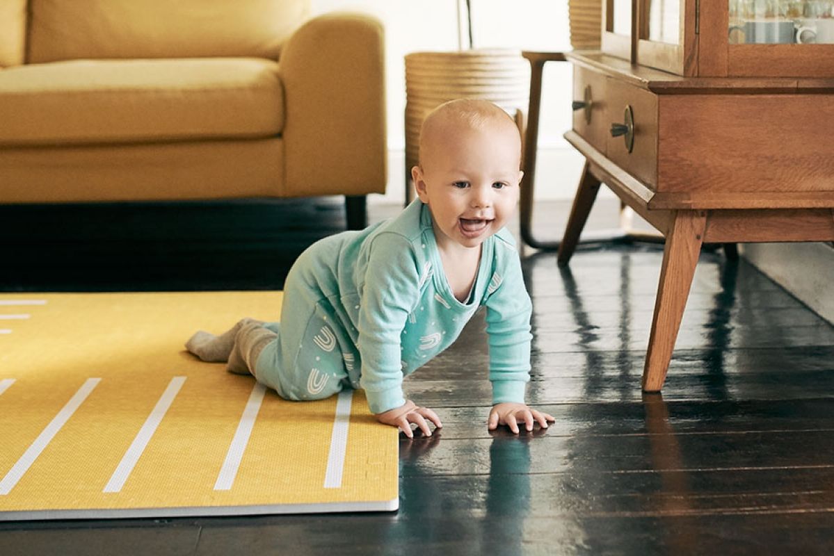 baby crawling in home