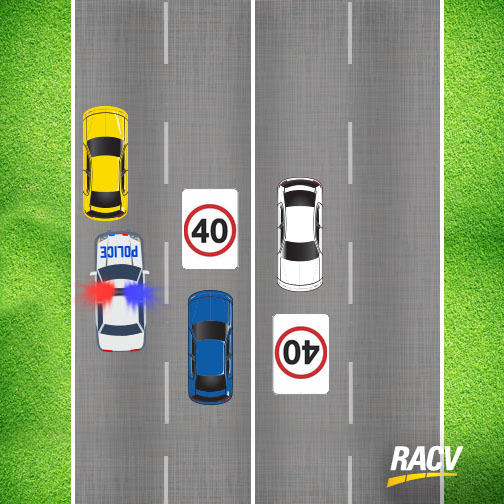 Cars passing an emergency vehicle on an undivided road