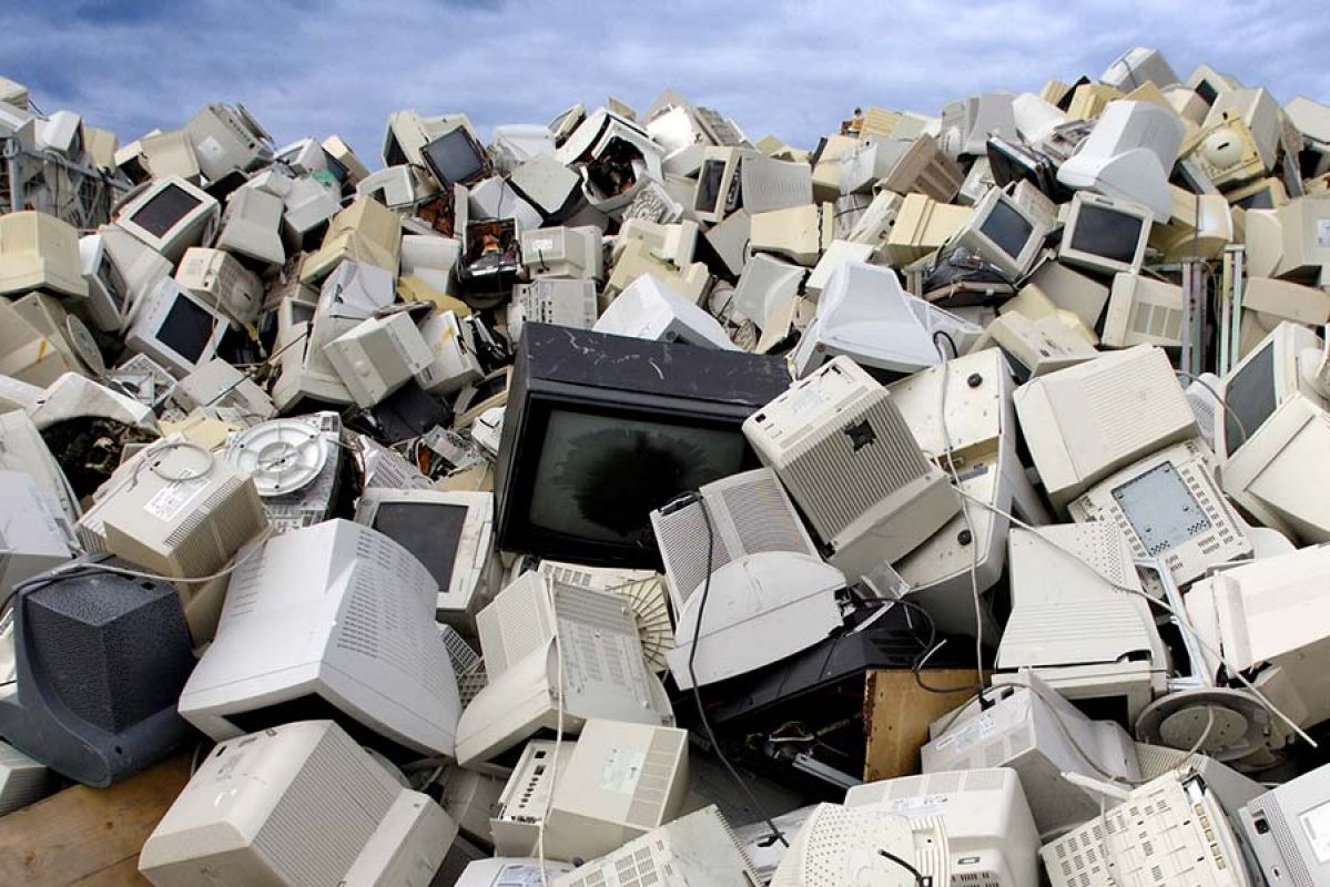 Abandoned computer monitors form a mountain of e-waste