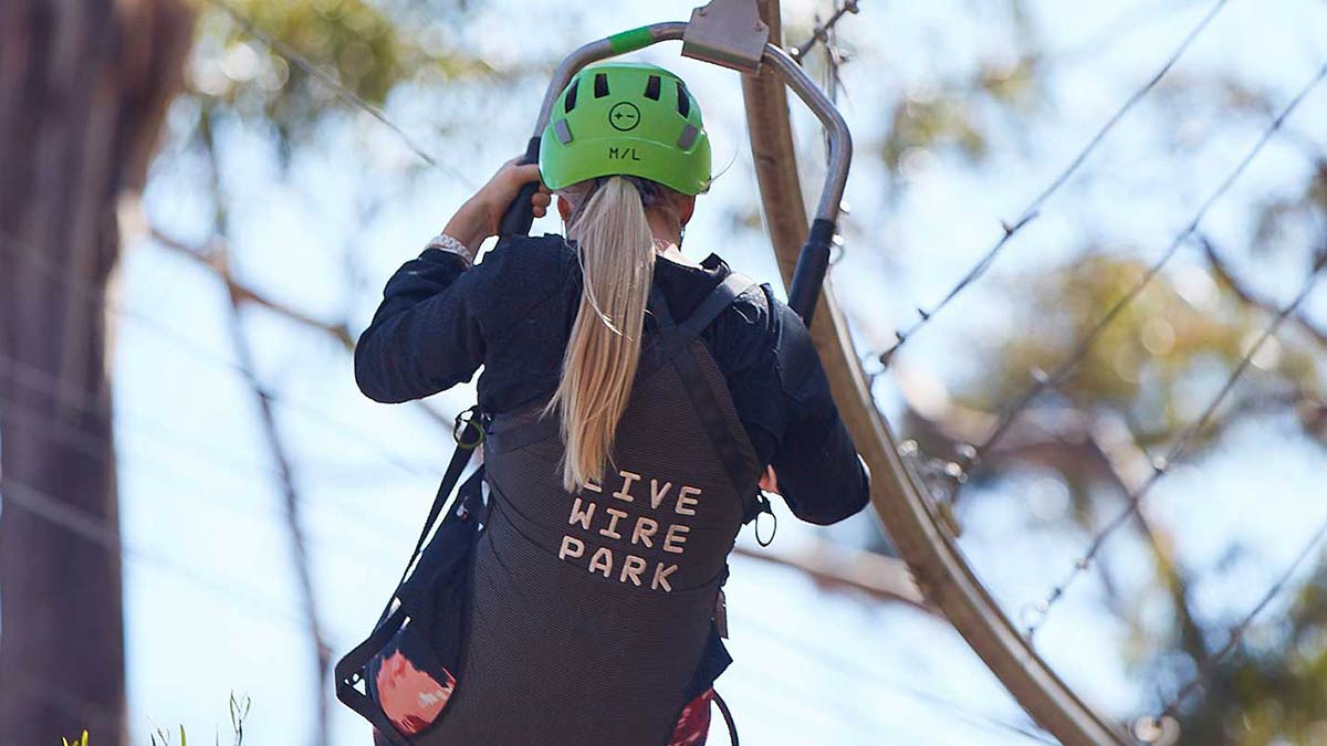 Woman with helmet at Livewire Park