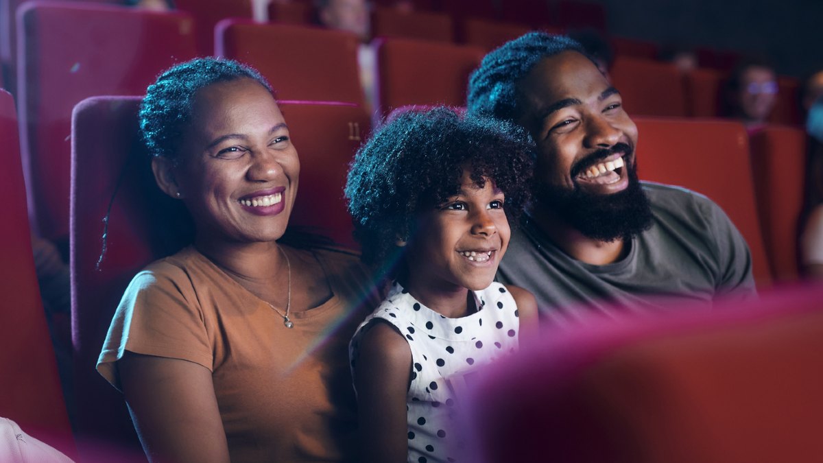 Couple kissing in cinema