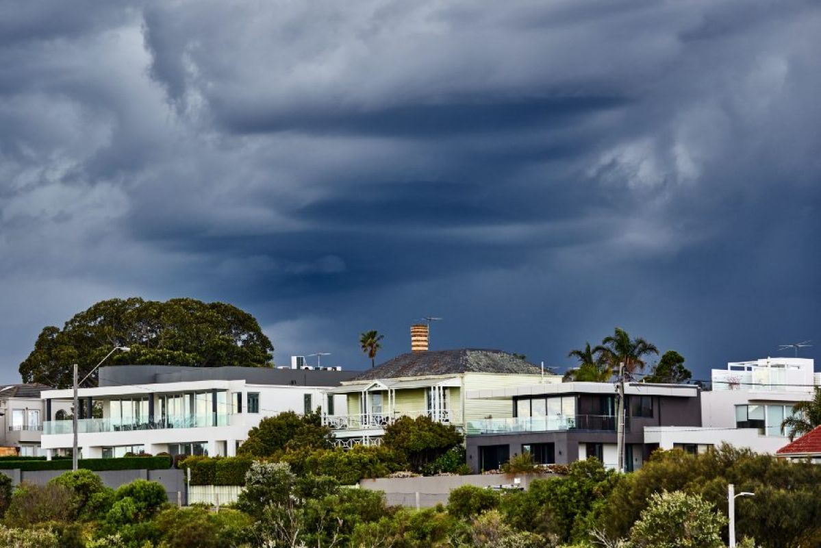 Houses with storm clouds