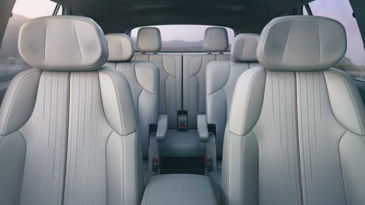 Interior view of Cadillac Vistra showing six-seat layout across three rows