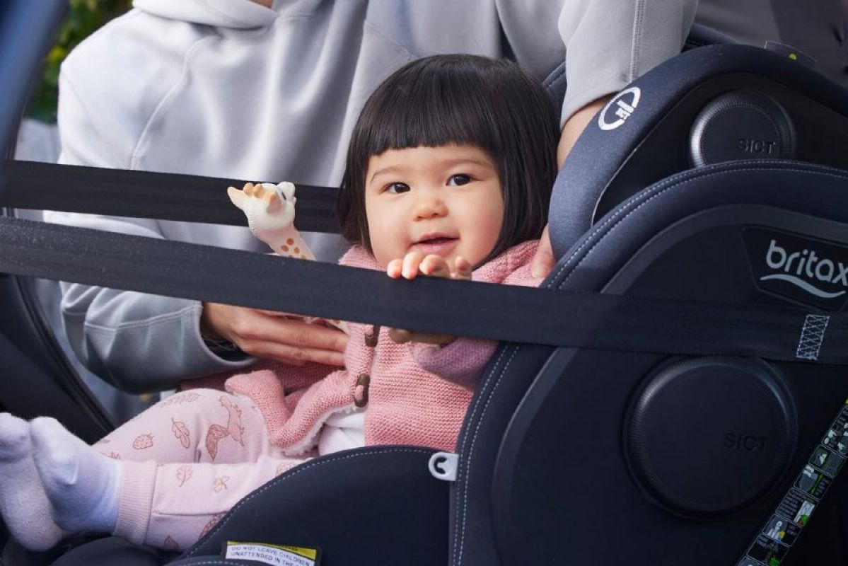 A baby in a child car seat