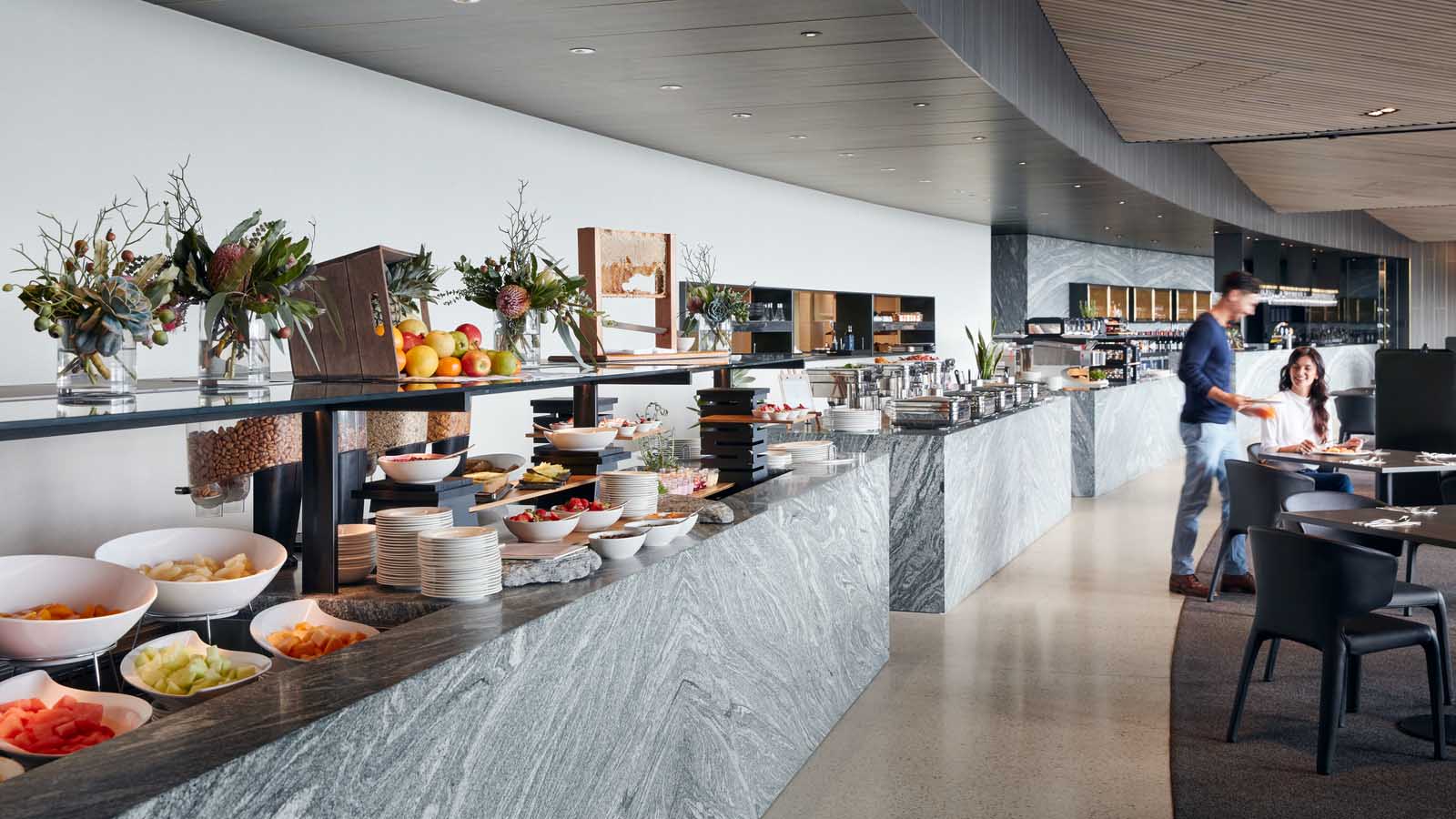 Couple dining in RACV's Cape Schanck resort breakfast buffet.