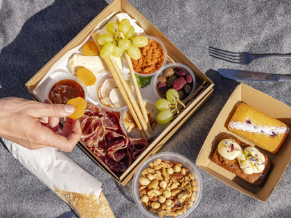 Charcuterie snacks in a box.