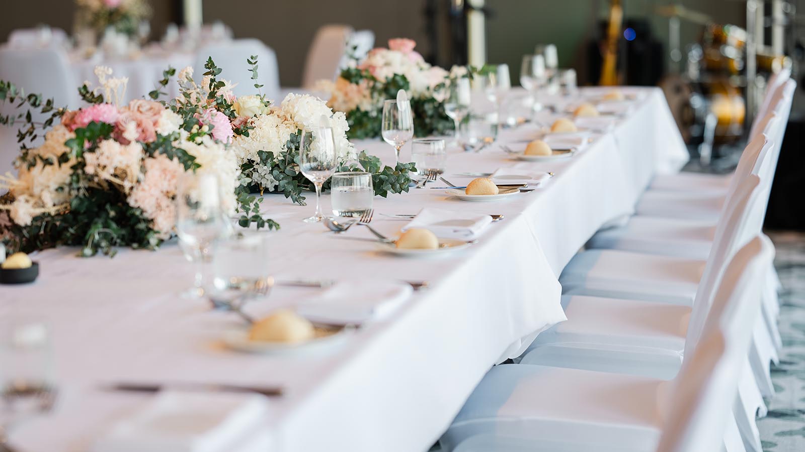 Wedding table setting at long table at RACV Torquay resort.