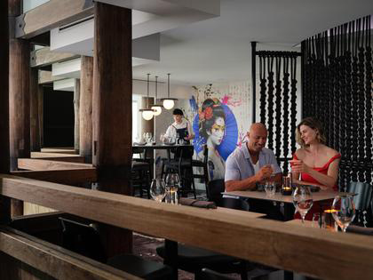 Couple having a drink together at Arakawa restaurant