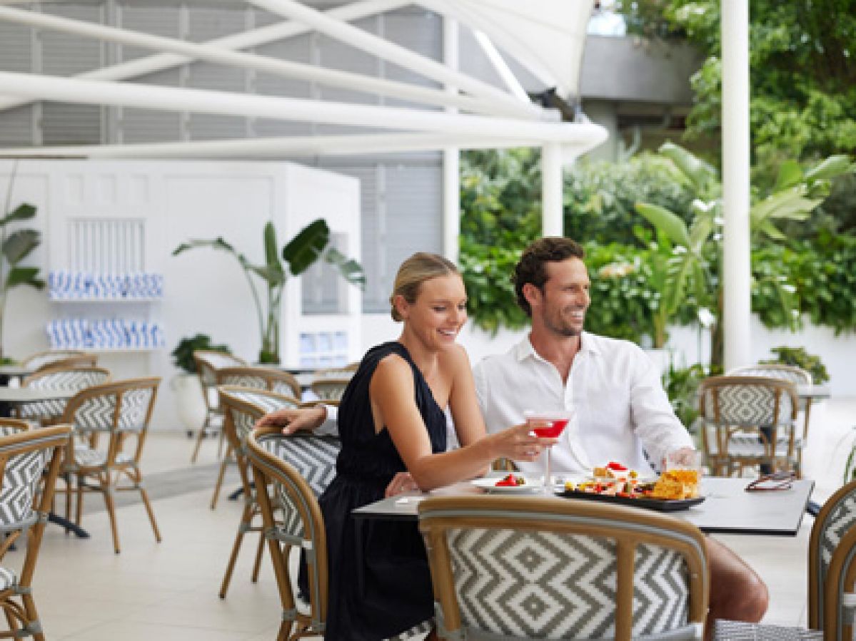 Couple having a drink together