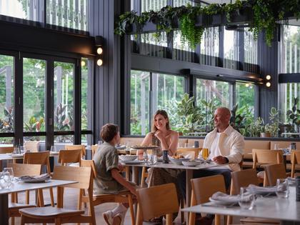 A young family dining at Amici.