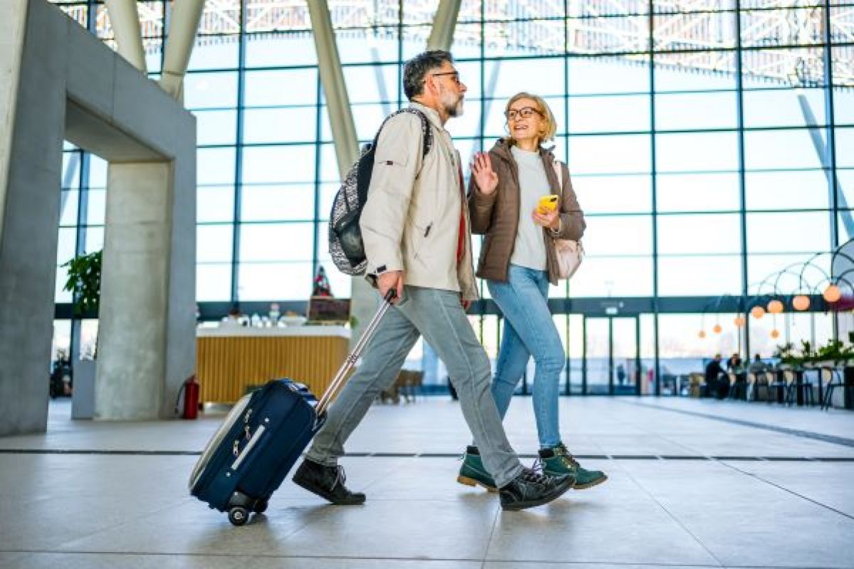 People at the airport about to embark on travel