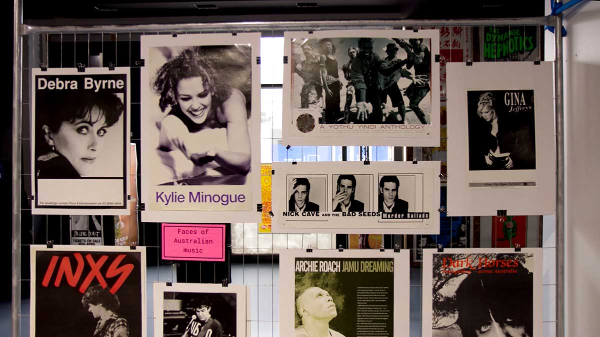 Kylie Minogue and INXS music posters.