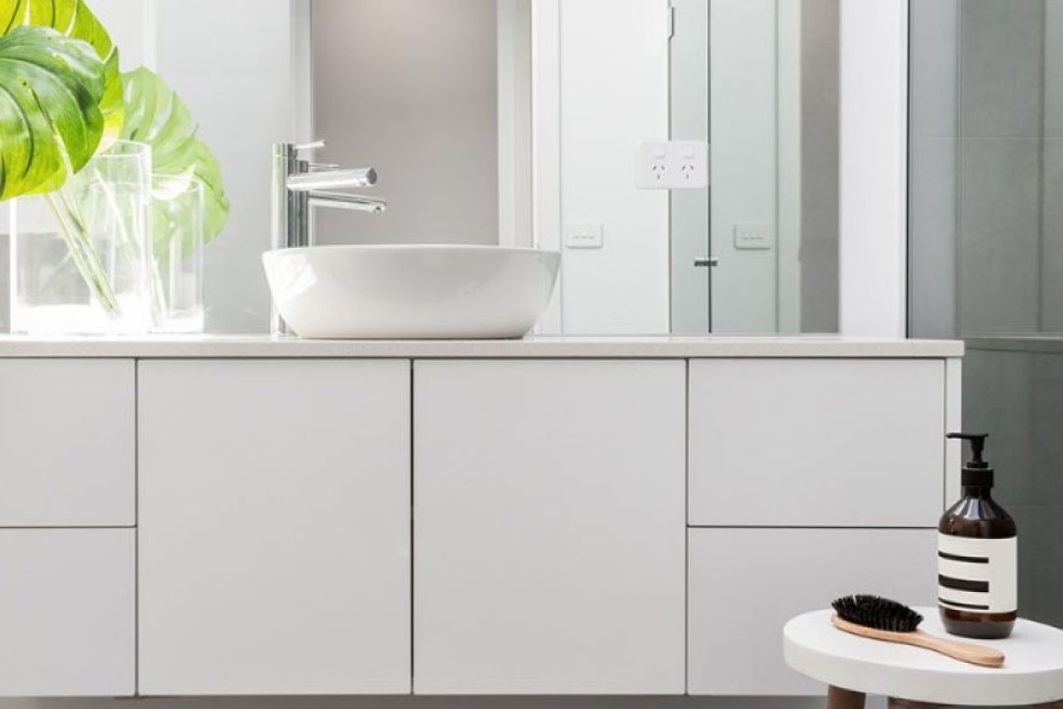 white bathroom cupboards and sink