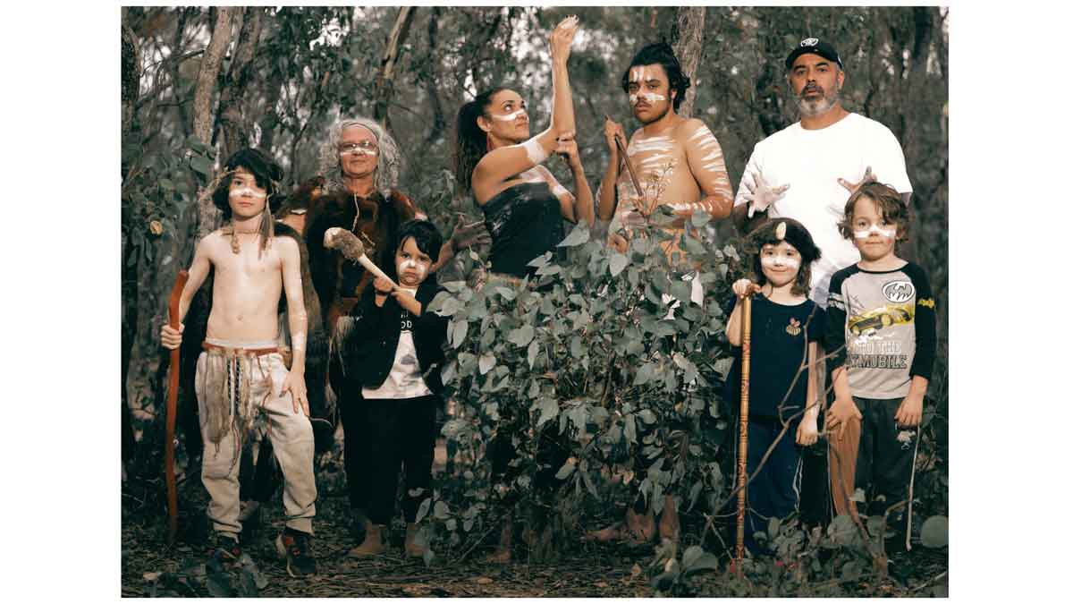 James Henry with Henry Harmony Nelson's Descendants – the Saunders family from Mooroopna, Meeting at Marna bulatj dharak (Meeting of arms), Lake Eppalock, 2021, colour photograph. From the series 18 Families, commissioned by Castlemaine Art Museum. Courtesy of the artist