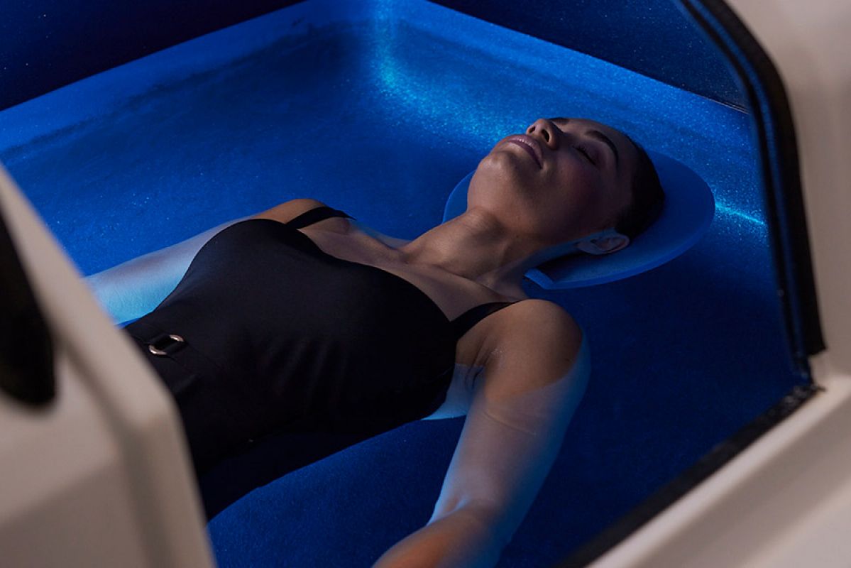 A woman relaxing in a float tank