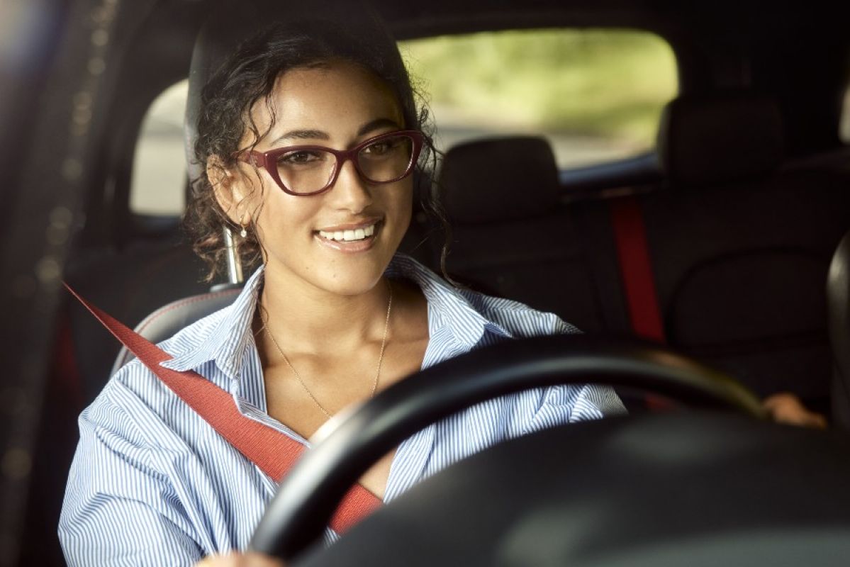 woman driving with glasses