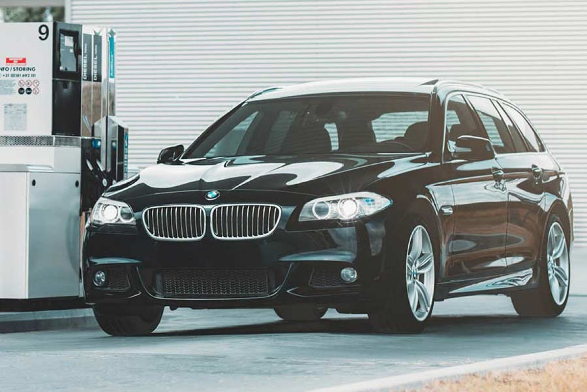 black car parked at petrol station