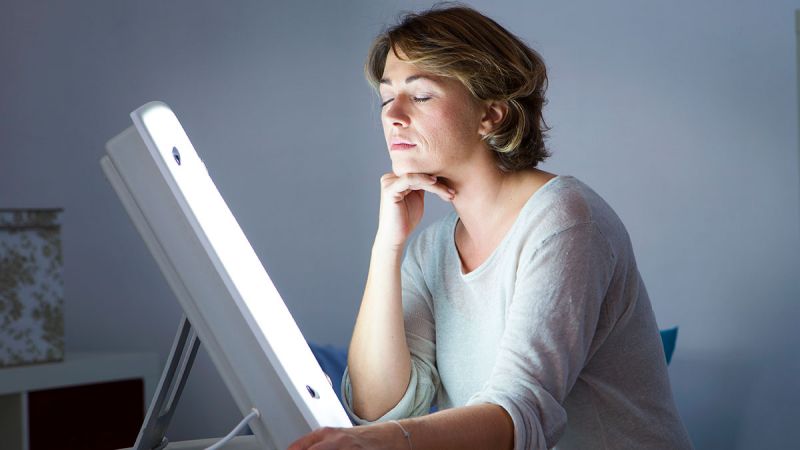 Woman having light therapy 