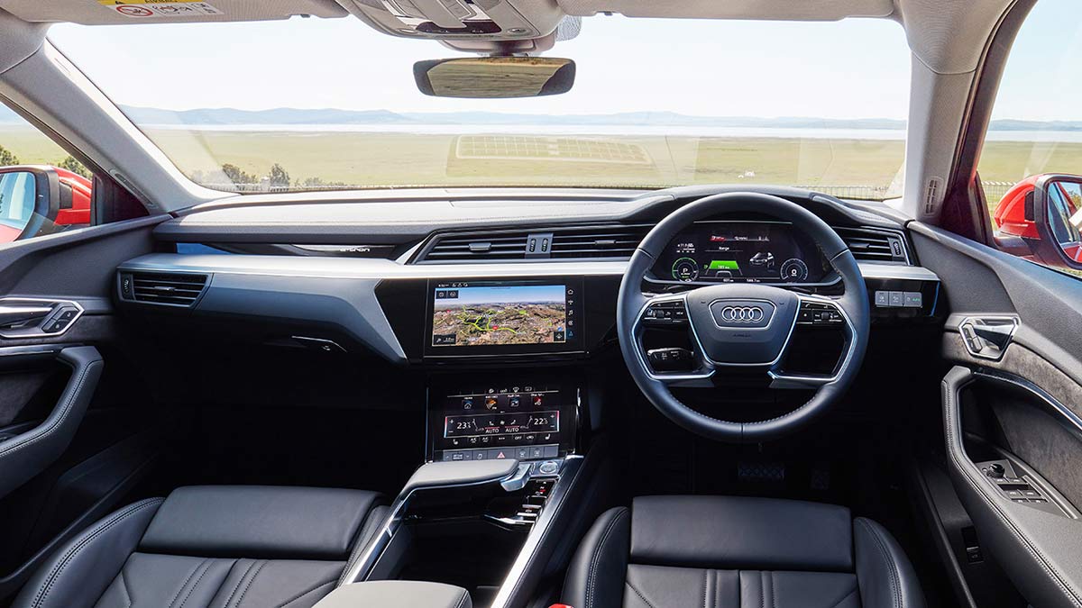 Interior, dashboard and steering wheel of Audi e-tron 50 Quattro