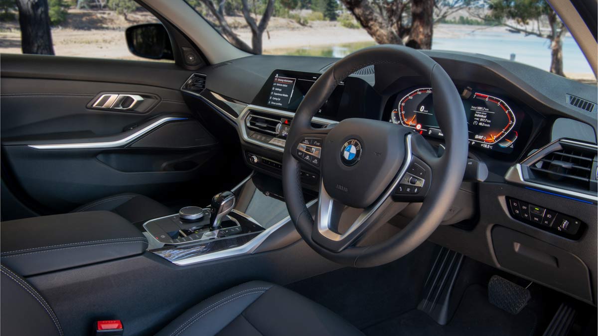 A BMW 330i M Sport sedan's dash layout and steering wheel