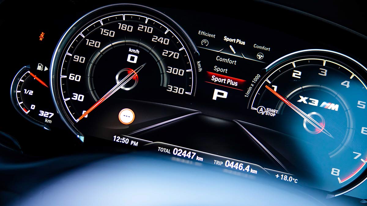 Close up of the instrument panel inside the BMW X3 M Competition 2020