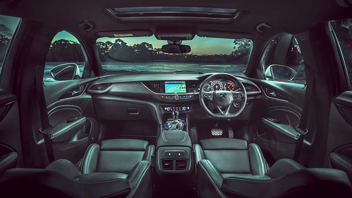 View of the Holden ZB Commodore's interior features: the front seats, steering wheel and dashboard