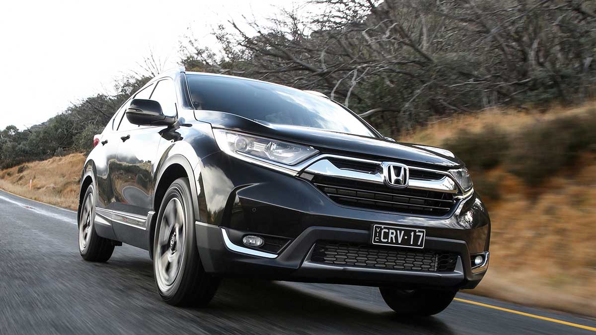 Front view of the Honda CR-V driving down road