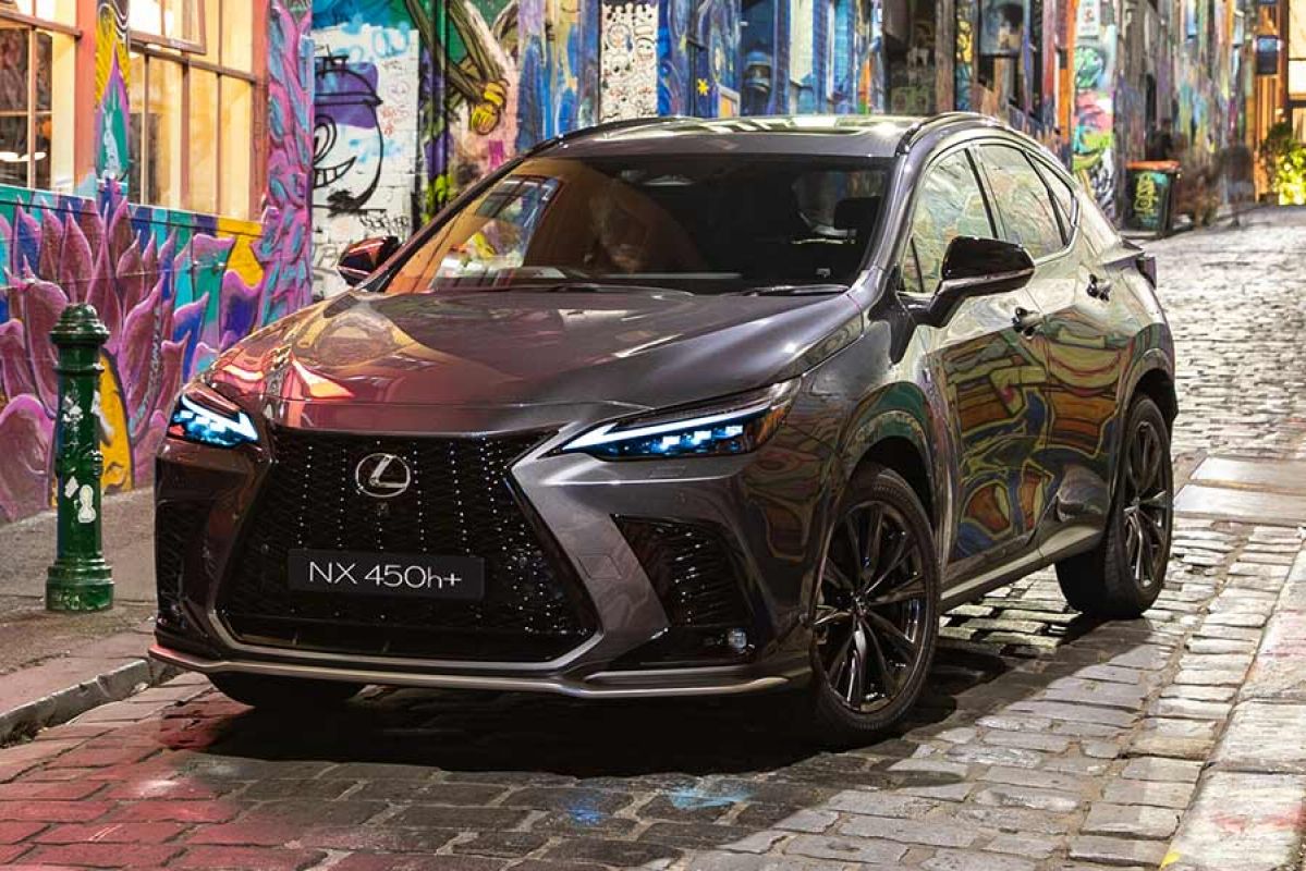 A Lexus NX450h+ parked in a laneway.