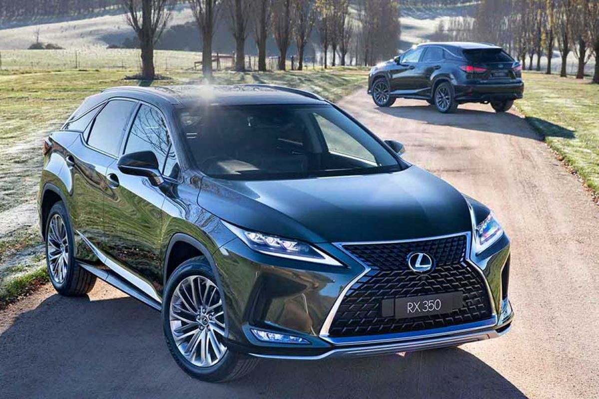 Two Lexus RX300 Sports Luxury parked on a country road