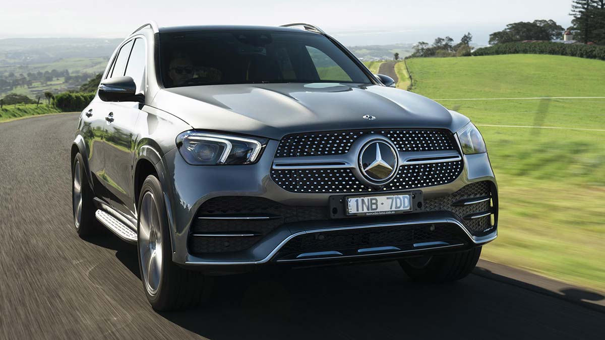 Front side view of a grey Mercedes-Benz GLE300d in motion