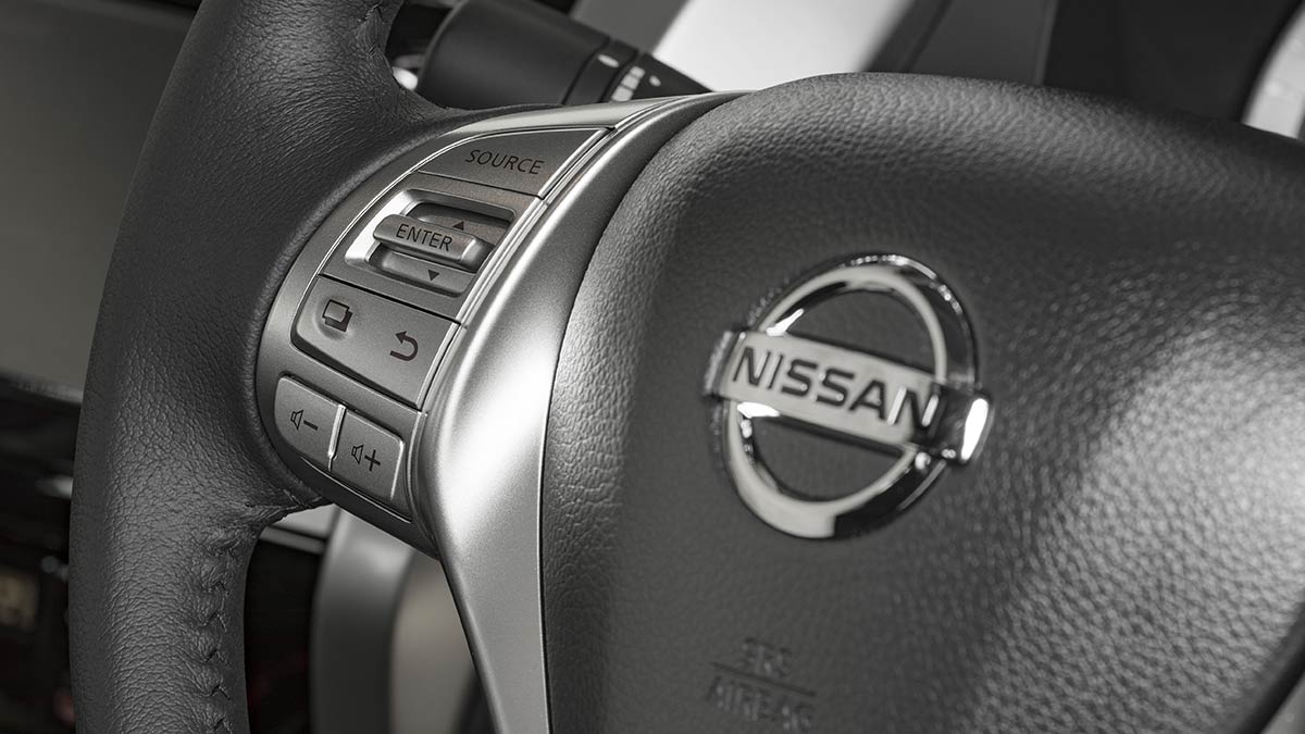 Close up of the steering wheel inside a Nissan Navara 2018 car