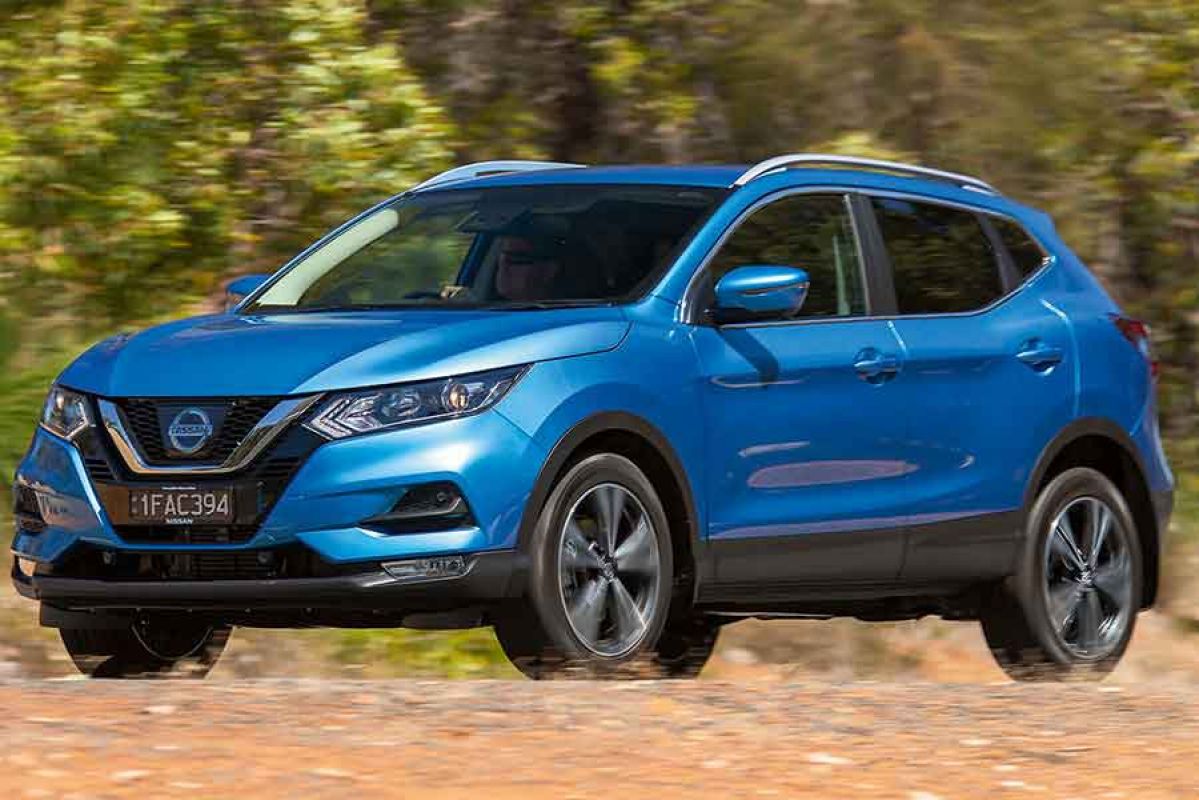 A blue Nissan Qashqai in motion