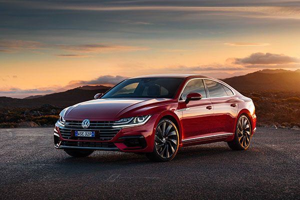 Dark-red Volkswagen Arteon R-Line 206TSI parked at mountain lookout