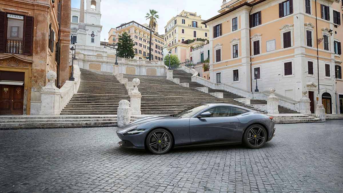 A silver Ferrari Roma at the bottom of the Spanish Steps