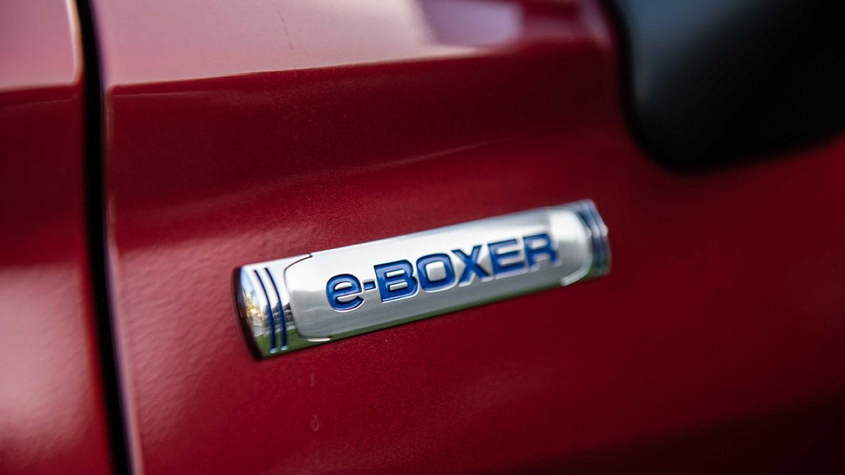 Close up of the e-BOXER badge on a red Subaru Forester Hybrid S 2020