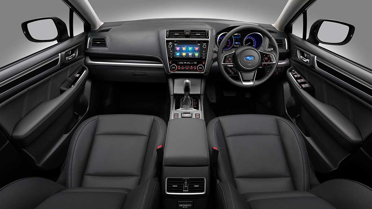 The Subaru Outback's interior features: the dash layout, steering wheel and the front seats