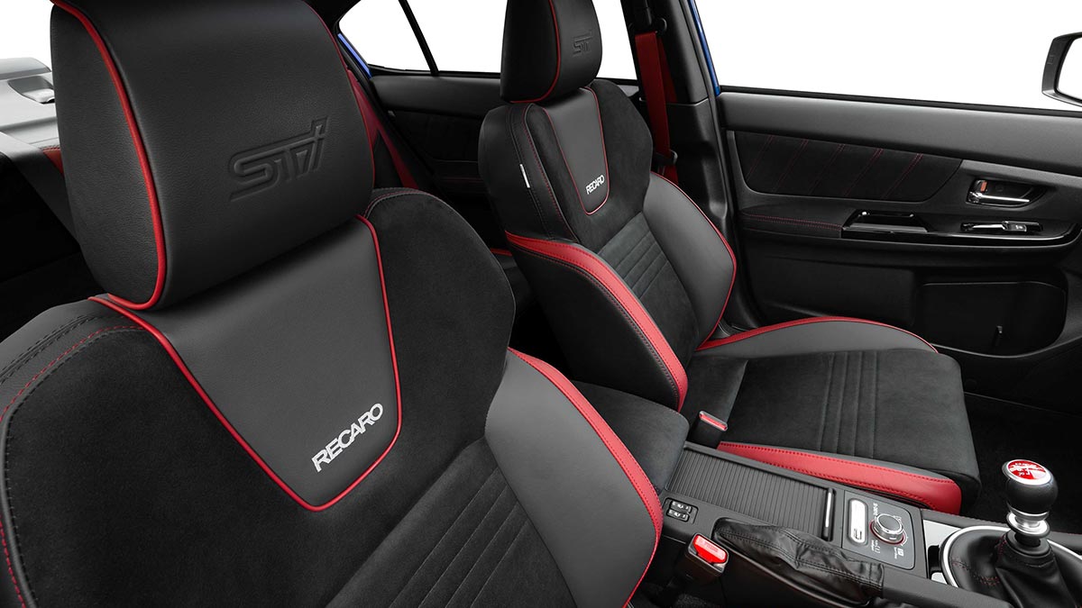 Black interior of the Subaru WRX STI spec.R showing the front seats with red details