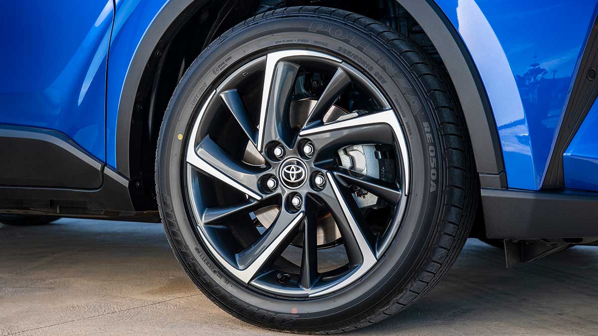 A blue Toyota C-HR Hybrid's tyre