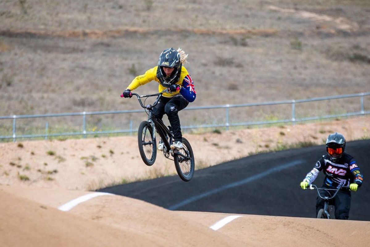 Des'ree Barnes on BMX bike jumping jump on a BMX track