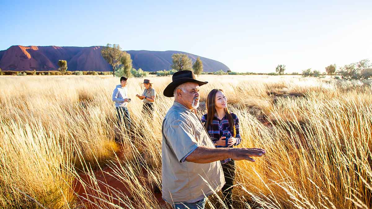 Tourists taking guided tour at Uluru