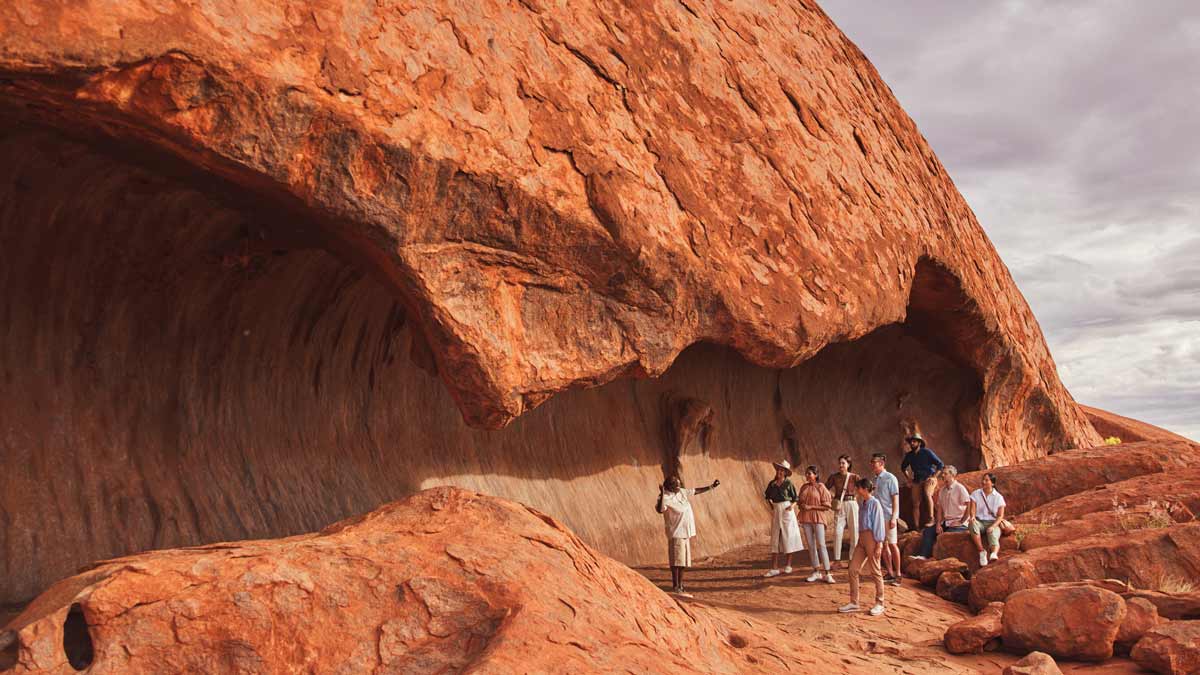 Group looking at rock formation