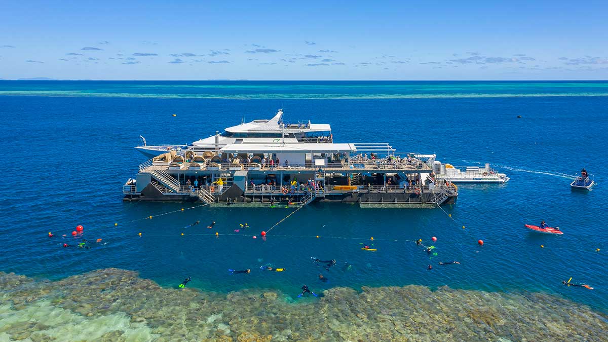 Cruise ship with people jumping off