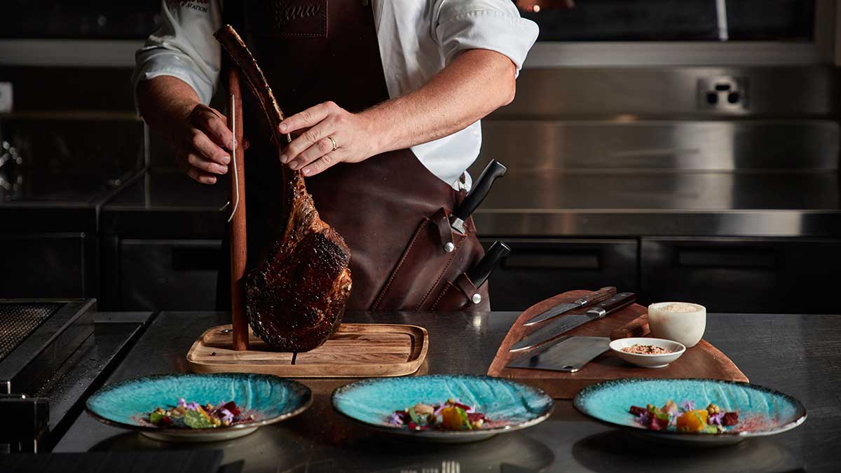 chef carving meat 