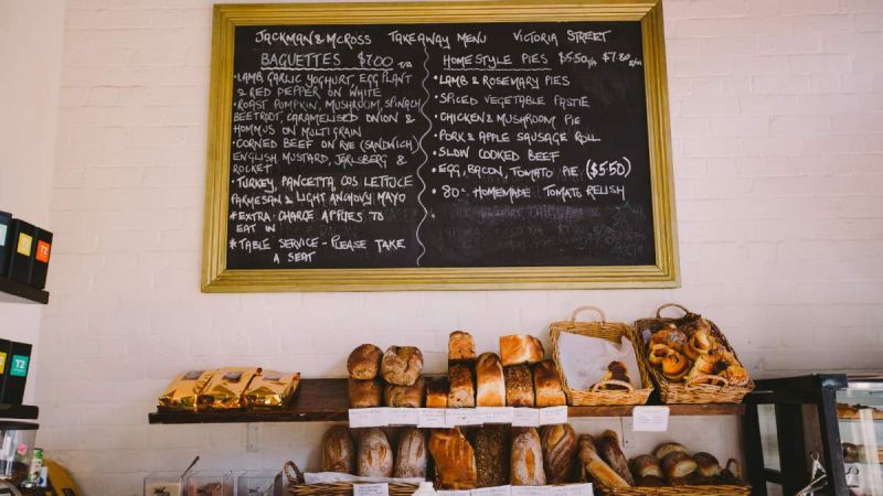 interior shot of bakery with chalkboard and bread