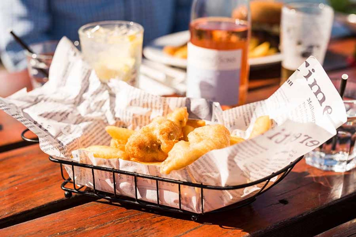 Close up of fish and chips in basket