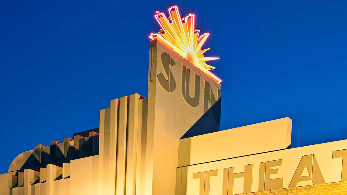 Sun Theater exterior at night