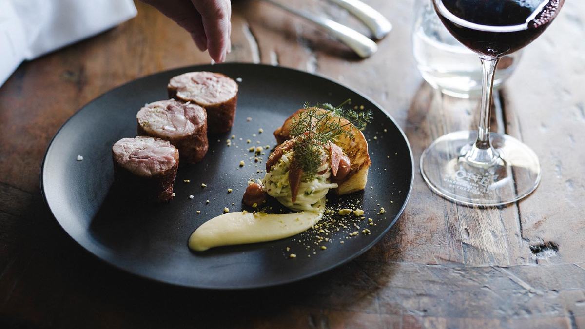 Plate of food with wine