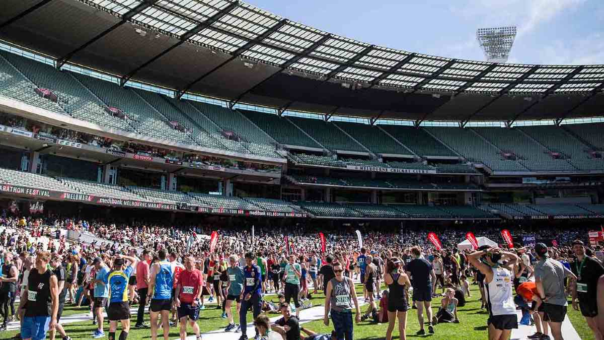 People stretching on the MCG