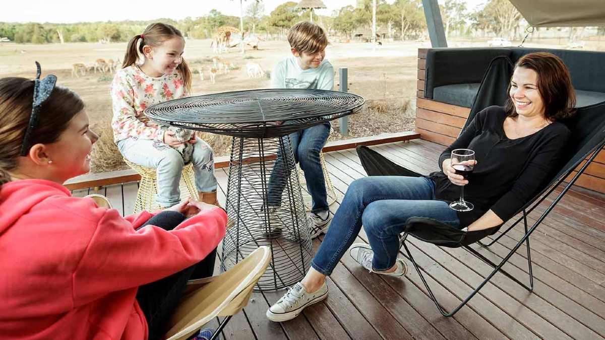 Family relaxing on a balcony